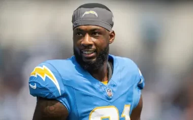Image of Mike Williams in the chargers powdered blue jerseys, smiling at the camera.